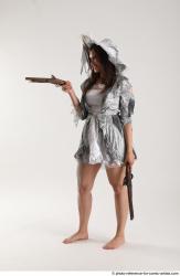 LUCI_AVIOL STANDING POSE WITH TWO GUNS